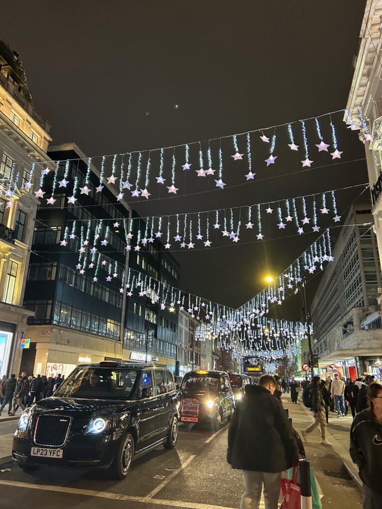 christmas lights trail london 2023 - oxford street christmas lights sky full of stars